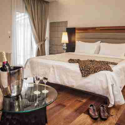 王后精品套房酒店 Rooms