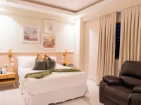 Hotel Stay Here Suites Hotels near Gascue