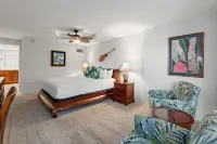 Spacious Living Area and Private Lanai - Charming Garden Retreat