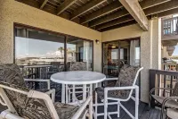 Newly Remodeled Oceanfront Condo with Salt Water Pool and Private Walkway to Beach by RedAwning