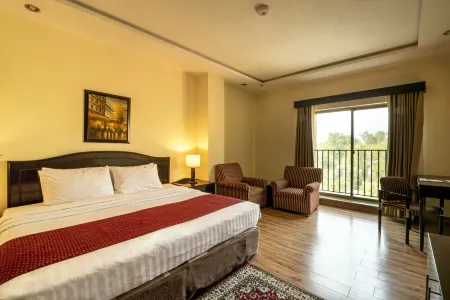 Hotel One Faisalabad Отели рядом с достопримечательностью «The Chenab Club»