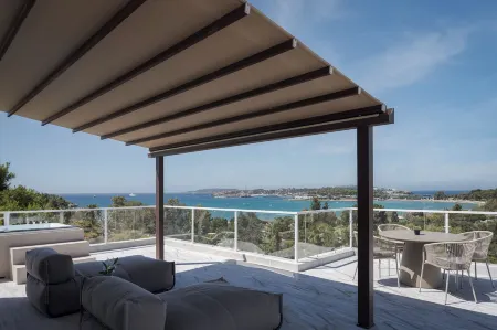 The Vouliagmeni Penthouse Отели в г. Вари-Вула-Вулјагмени