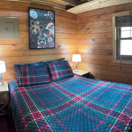 Charming cabin in delightful Duquette with AC near miles of ATV trails.