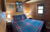Charming cabin in delightful Duquette with AC near miles of ATV trails.