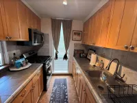 Spacious, Great Location. Close to Beaches!- 1 bedroom condo - Pool, WiFi, AC!