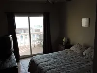 2 bed,2 bath upper condo only steps from the beach. 360 degree views.of ocean!