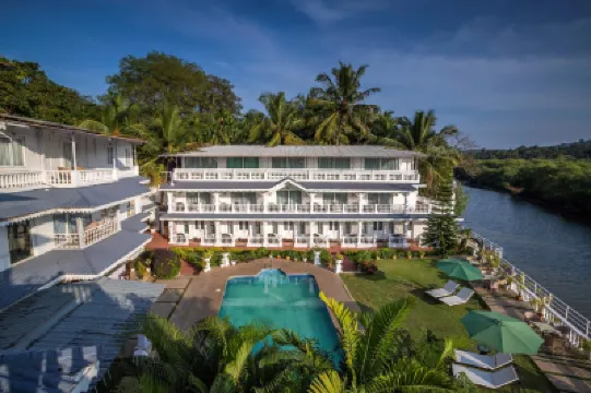 Stone Wood Riverfront Resort, Siolim Hotel a 