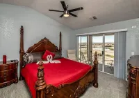 Riverfront Ruby Red Home & Spa & Private Dock & Inlet Fun!