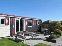 Chalet Florence 5 , 6- Persoons met Veel Privacy; Huisdiervrij,ruime Tuin Hotels in Serooskerke