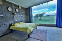 Amboseli Glass house Hotels in Kimana