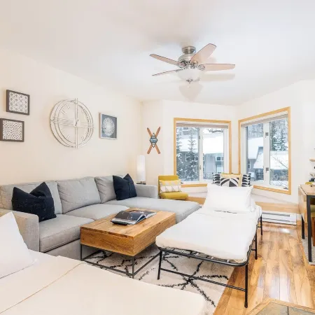 Modern Comfort River/Mtn Views + Hot Tub 1 Bedroom Condo by RedAwning