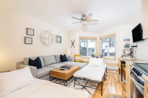 Modern Comfort River/Mtn Views + Hot Tub 1 Bedroom Condo by RedAwning - parking