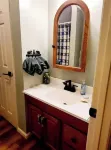 Spacious suite surrounded by nature with living room, fireplace, porch, fire pit