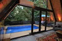 Kışın Isıtmalı havuz keyfi. Yazın yeşilin her tonunun keyfini sürmek için köyevi فنادق في Masukiye Mahallesi