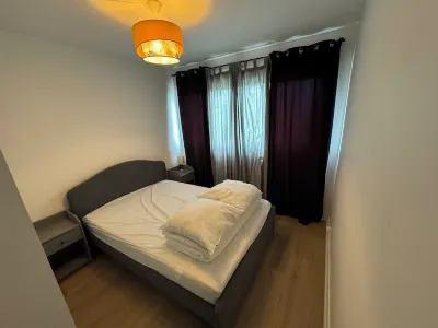 Studio Grigny (2) Hotels near Curé Garden