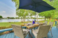 Waterfront Lake City Home w/ Deck & Boat Dock! Hotel di Cadillac