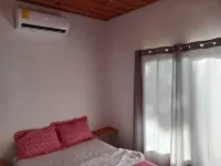 Charming 2-bedroom villa in peaceful Provincia de Alajuela with AC, WiFi Hotels near Rotonda Florencia de San Carlos. PUNTO DE REFERENCIA.