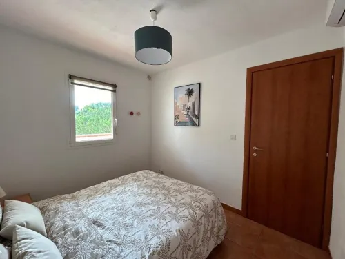 Apartment in residence with swimming pool and private beach