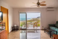 Apartment on the beachfront with parking, pool and gym