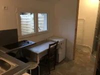 Self-contained studio, sunny courtyard, close to beaches and shops