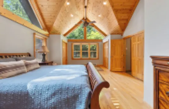 Whitefish Chain Lake Home with Beach + Sauna + King Beds + Kayaks +Paddle Boards