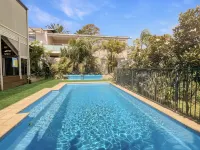 Coastal Upper-Level Home with Pool Access Hotels in Batehaven