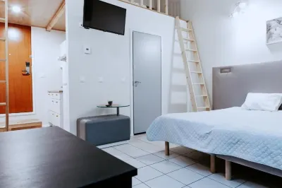 Cozy Suites Hotel a 