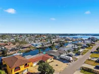 4 bedrooms home located on the deep water canal 13630 Garris Dr. Hudson Fl 34667
