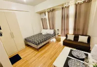JFam Suites - chambre d’hôtes