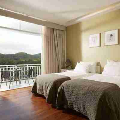 Santosha Health & Lifestyle Resort Rooms