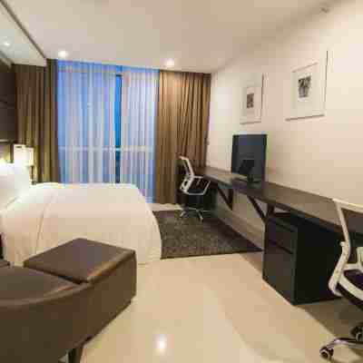 Platinum One Suites Rooms