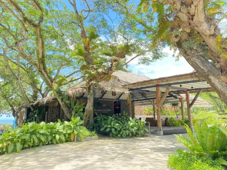 Magnaga Waters Beach Resort Отели в г. Мабини