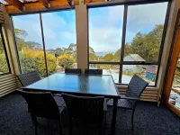 Cosy water view cabin in amongst the pristene wilderness of Central Highlands Hotels in Cradle Mountain