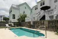 Island House D : Stylish Updated Townhome - Steps to the Beach w/ Pool!
