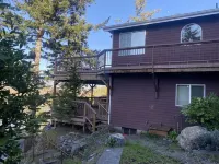 Rogue River Water Front with Hot Tub and Fenced Yard Hotels in Gold Beach