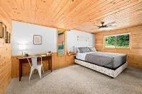 Secluded 4-season cabin w/private waterfront, epic game room & mins from trails