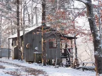 Line Camp Cabin is Secluded in The Woods Near The River.