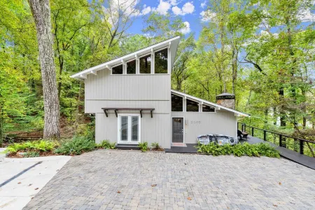 Lakefront Luxury Cabin Retreat with Jacuzzi & Party Dock