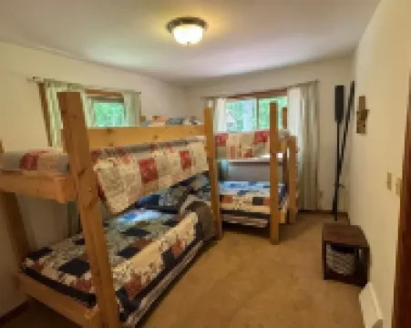 Beautiful 3 bed/2bath updated cabin w sandy swimmable frontage & great fishing.