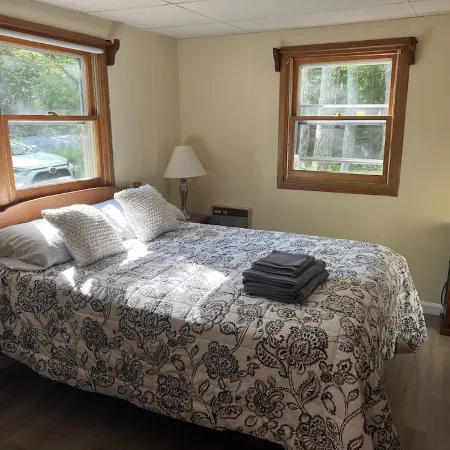 Romantic Pocono Lake Chalet: Firepit, Stream, near Lake, pools & Pet-Friendly