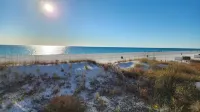 Freshly updated beachfront condo with stunning views.  Sleeps 4.  Onsite Pool.