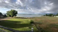 Just steps to the beach.  Lakefront Property with Endless Views.