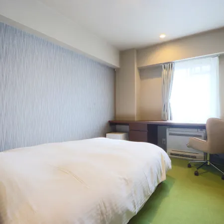 Business Hotel Takara Отели рядом с достопримечательностью «Железнодорожный вокзал Кусацу»