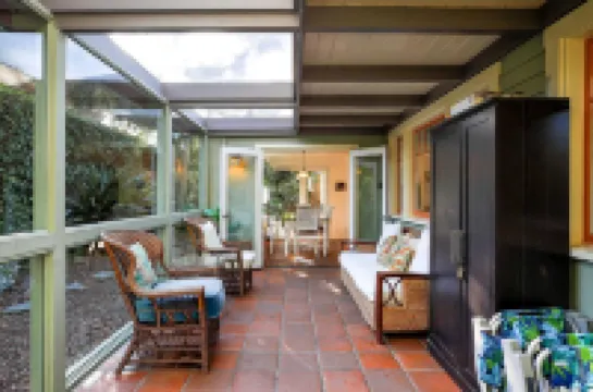 Charming Cottage with Deck and Spacious Yard - Tranquil Beach Retreat