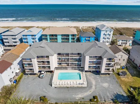 Steps to the Beach and Refreshing Pool - Inviting Coastal Haven