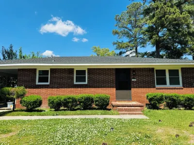 Charming 3-bedroom house just minutes from DT Wilson. Enjoy a comfortable stay! Hotels near Art at 123 Studio