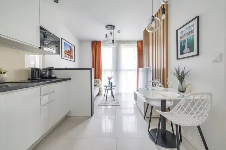 Apartamenty Aura 40 Q4Apartments Отели рядом с достопримечательностью «Ректорская церковь отцов кармелитов Святой Екатерины»