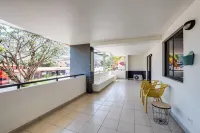 Urban Oasis in Santa Ana Centro: 2BR & Terrace near Everything