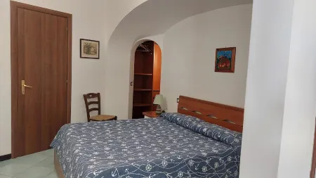 THE MERIDIANA APARTMENT ON THE SEA WITH PRIVATE BEACH SDRAIO AND UMBRELLA