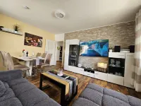 Bright and modern apartment on the ground floor in the center